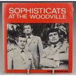 Sophisticats - At The Woodville (SPEC EP 1001). Record appears Ex with fading to one side of picture