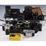 Collectable cameras to include FECA plate camera, Canon Pellix SLR with 50mm 1:1.8 and 135mm 1:3.5