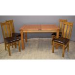 Contemporary solid oak extending dining table W140 x D90 x H77cm, when extended W170cm, with four