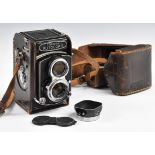 Minolta Autocord TLR camera with 75mm 1:3.5 lens, in leather case with lens cap and hood