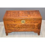 Oriental carved coffer or chest with brass clasp, W86 x D42 x H51cm