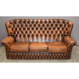 Chesterfield brown leather wing back three seat sofa