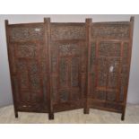 Oriental pierced / carved hardwood trifold screen, width extended 210cm x height 185cm