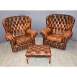 Pair of Chesterfield leather wingback armchairs and matching footstool