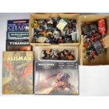 A collection of Warhammer and Warhammer 40k miniatures and books including Empire, High Elves,