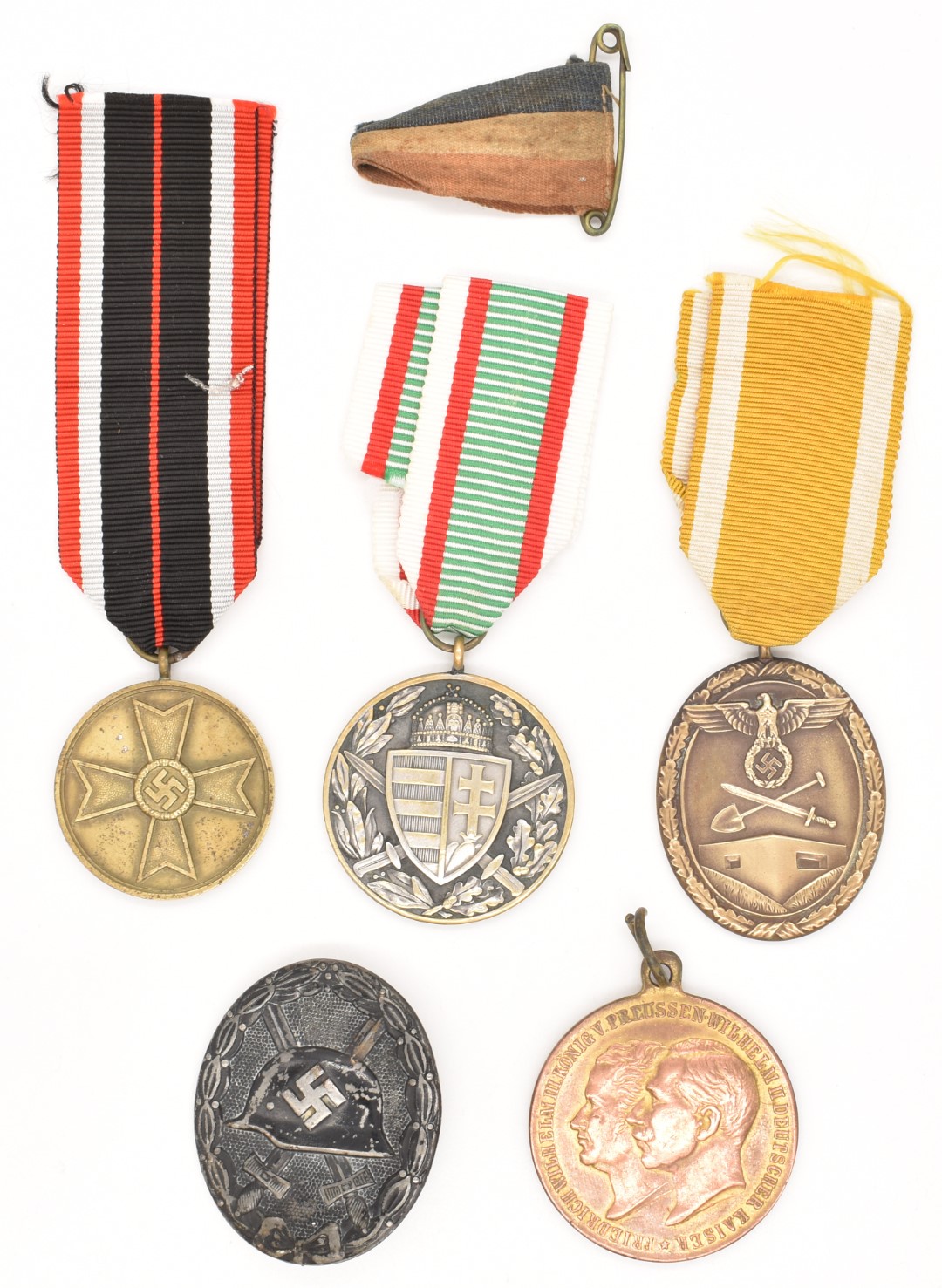 German WW2 Nazi Third Reich War Merit Cross Medal, Atlantic Wall Medal and a Wound Badge, together