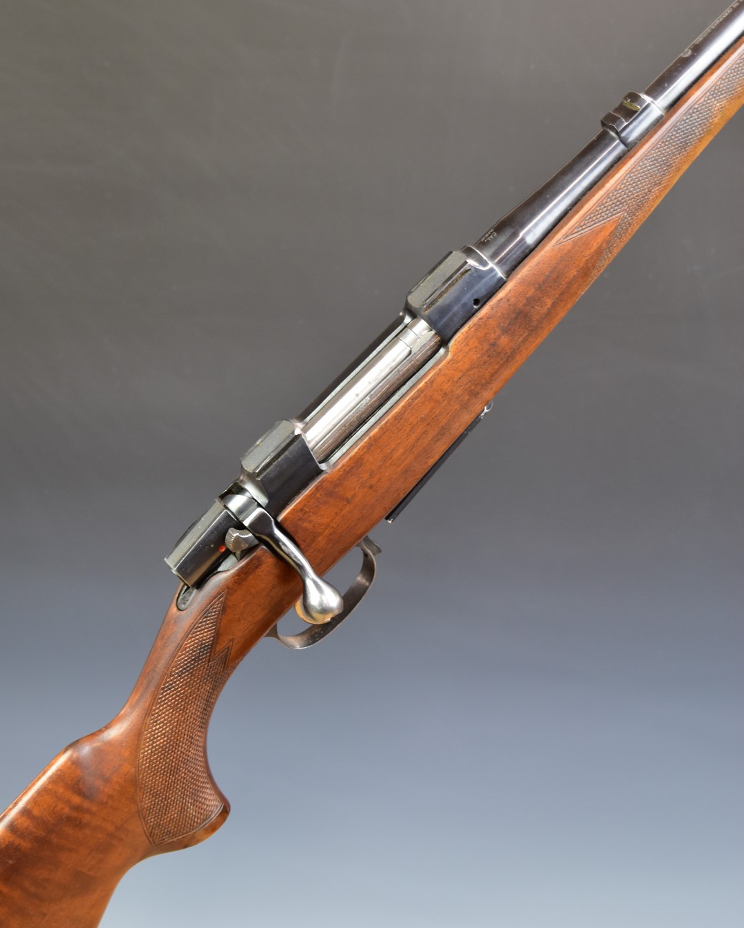 BRNO CZ 537 .243 bolt-action rifle with chequered semi-pistol grip and forend, raised cheek-piece,