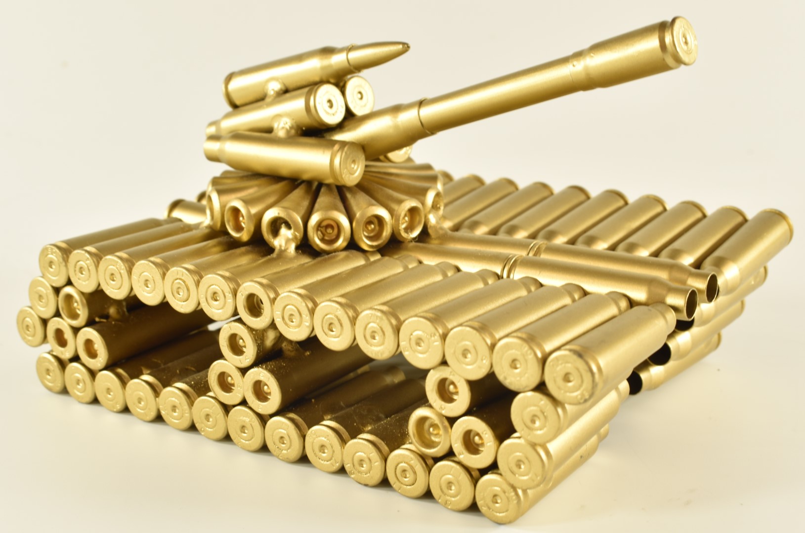 Novelty trench art type model of a tank formed from bullet cases, length 16cm