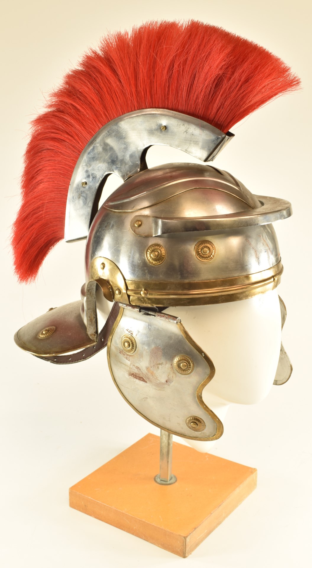 Replica Roman Centurion's steel helmet with red plume, brass edging and rosettes and leather lining. - Image 2 of 7