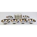 Fifteen pieces of Sèvres Art Deco style cups and saucers with silvered interior