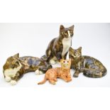 Four Mike Hinton Winstanley style pottery cats, tallest 28cm