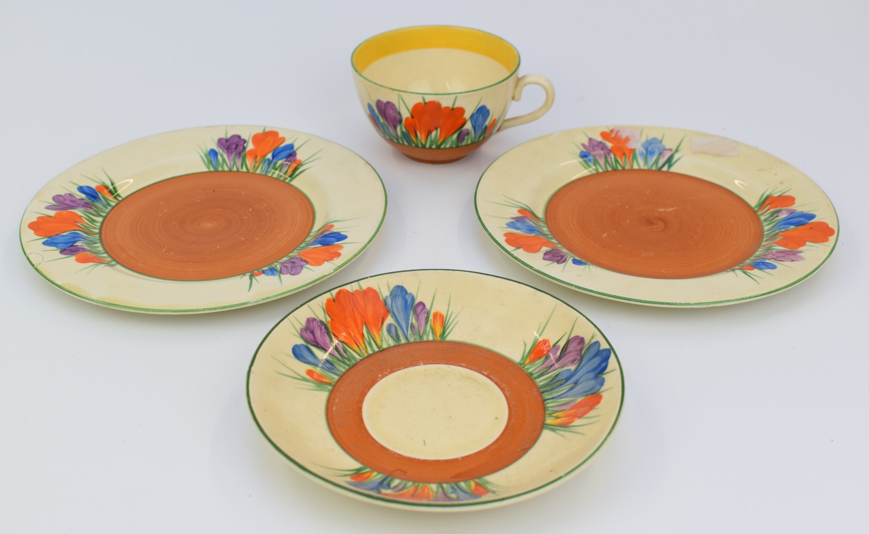 Clarice Cliff for Newport Pottery trio decorated in the Crocus pattern, with additional tea plate, - Image 6 of 8