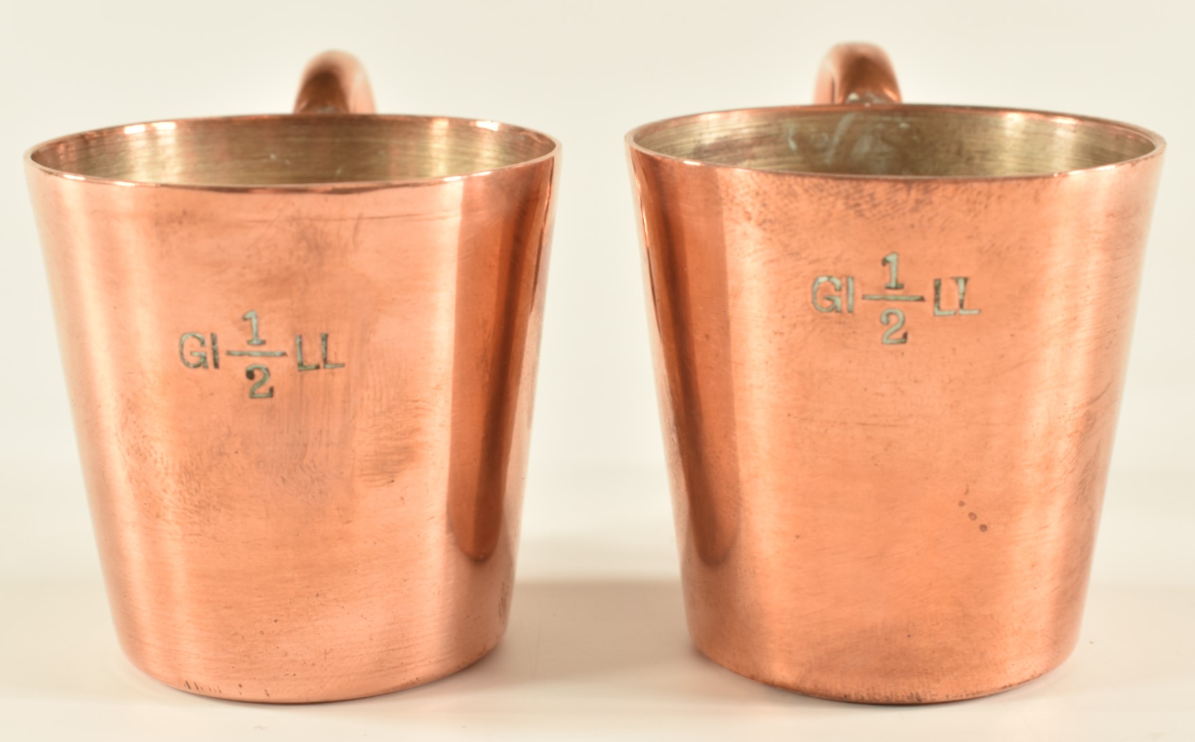 Pair of Royal Navy half gill copper rum measures with crown cipher and broad arrow marks to base - Image 2 of 4