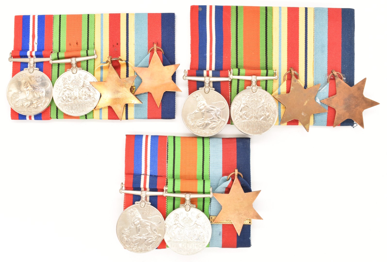 Three British Forces WW2 medal groups comprising a group of three, 1939-1945 Star with clasp for - Image 2 of 2