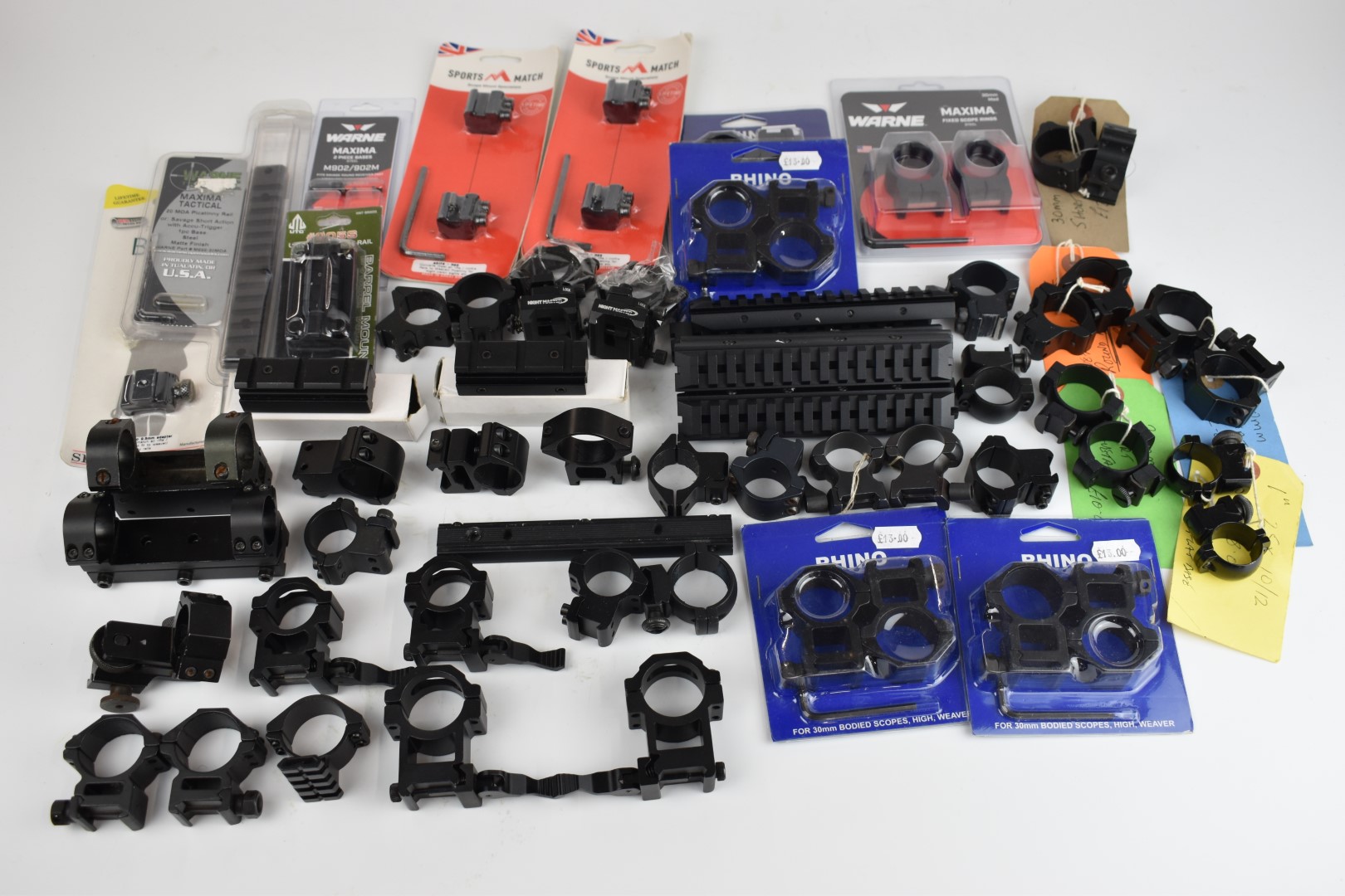 A large collection of rifle scope mounts and mount sets including Rhino, Warne, Sports Match,