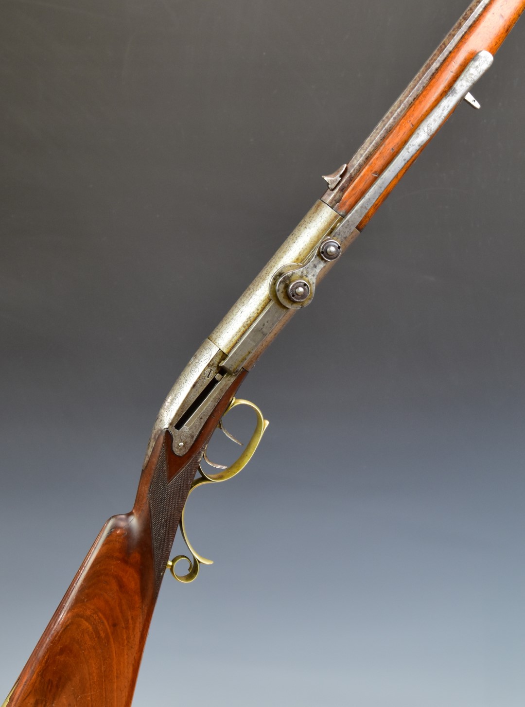 G Richter of Breslau side-lever cocking 8mm air rifle with named top plate, scrolling engraving to