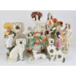 Collection of Staffordshire figures including poodle together with Continental figurine with fan