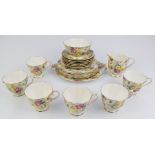 Twenty one pieces of Royal Albert tea ware including cake plate decorated in a floral chintz