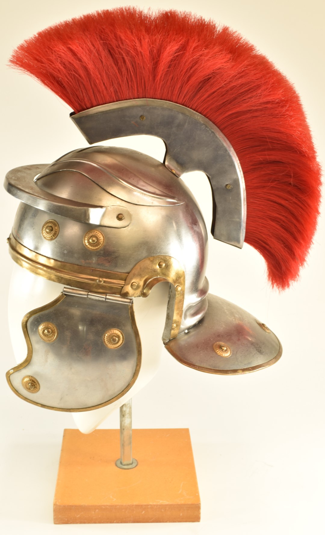 Replica Roman Centurion's steel helmet with red plume, brass edging and rosettes and leather lining. - Image 4 of 7