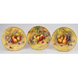 Royal Worcester three painted fruit cabinet plates, two signed A Shuck for Albert Shuck and one
