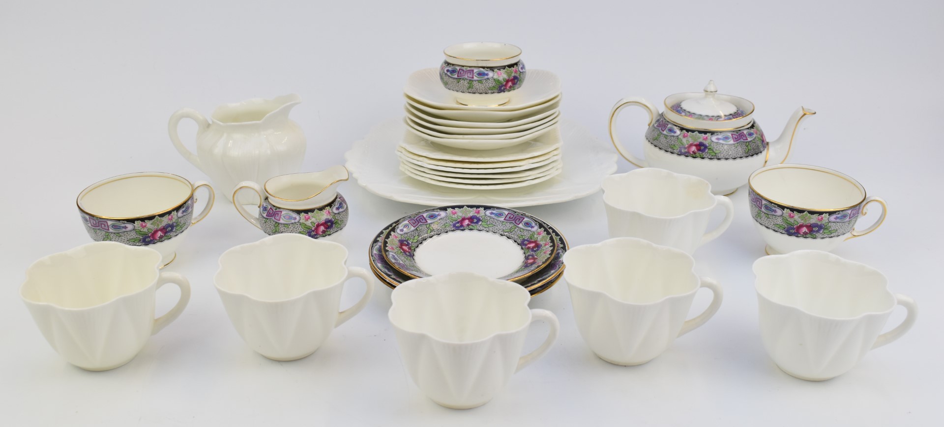 Shelley teaware with relief moulded decoration together with an Aynsley part tea set pattern no