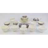 Shelley teaware with relief moulded decoration together with an Aynsley part tea set pattern no