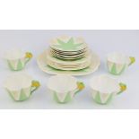 Eighteen pieces of Shelley Art Deco tea ware decorated in the Apple Green Star pattern no 119939,