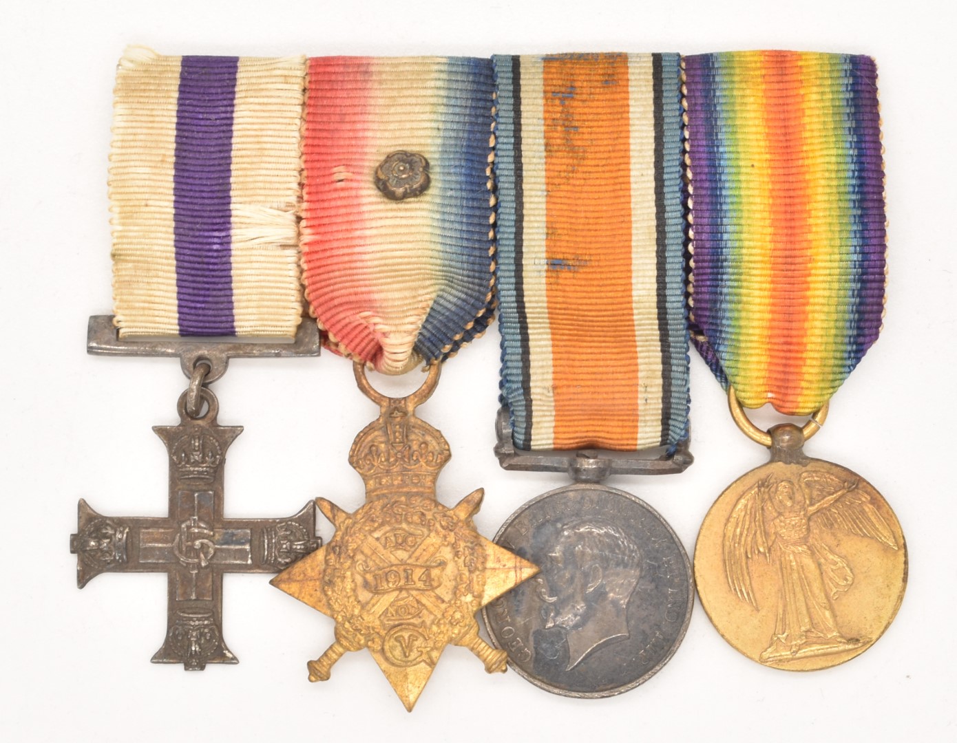 WW1 Military Cross group of four miniatures comprising Military Cross (stamped silver to reverse),