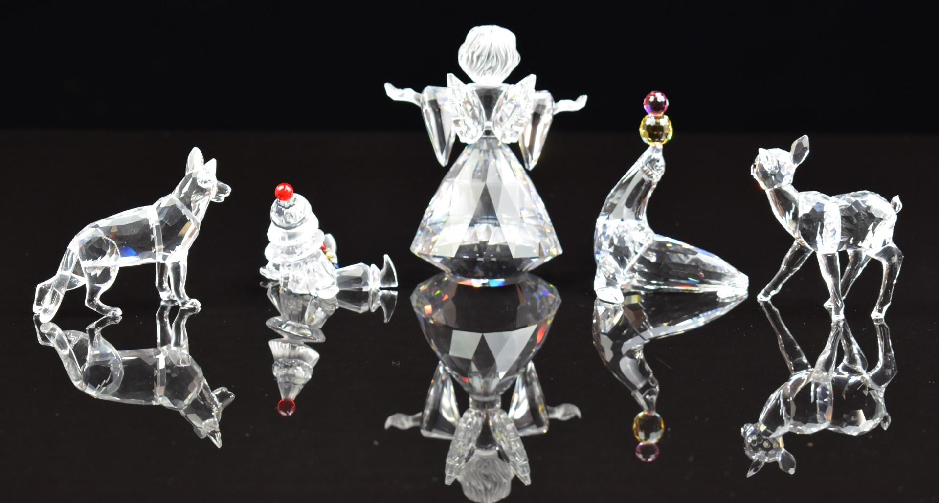 Five Swarovski Crystal cut glass figures and animals comprising angel, seal, clown, deer and - Image 2 of 3