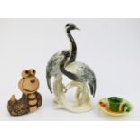 Karl Ens porcelain figure of two herons, Japanese chamber stick and John Hughes pottery snail,