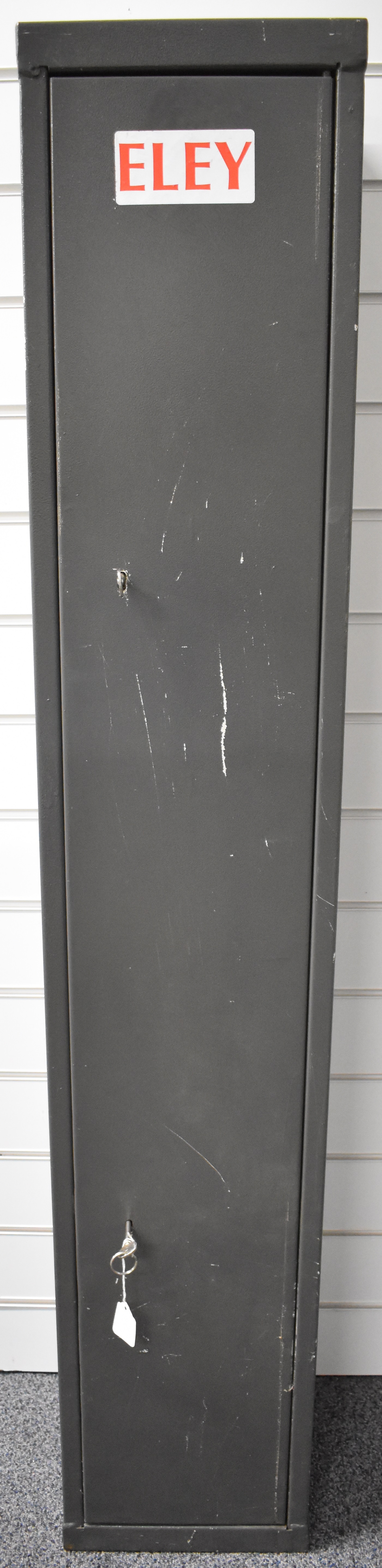 Metal gun safe or cabinet fitted out with shelves for ammunition, 138x25x25cm.