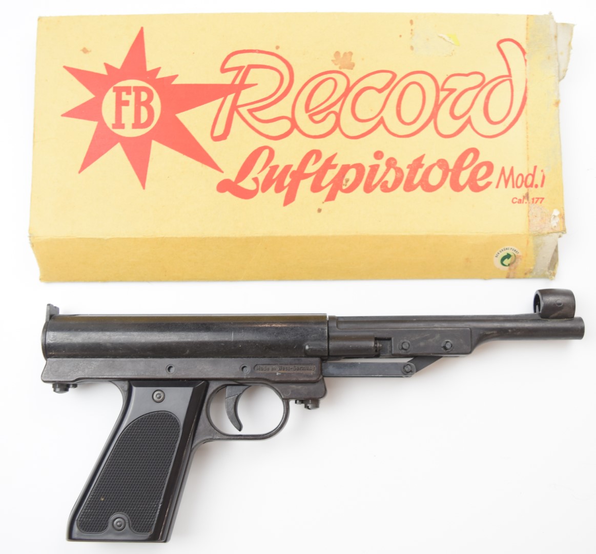 Record Luftpistole Model 1 .177 air pistol with shaped and chequered grip, in original box.