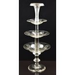 A near pair of clear cut glass three tier fruit stands, each with etched decoration, 65cm tall.