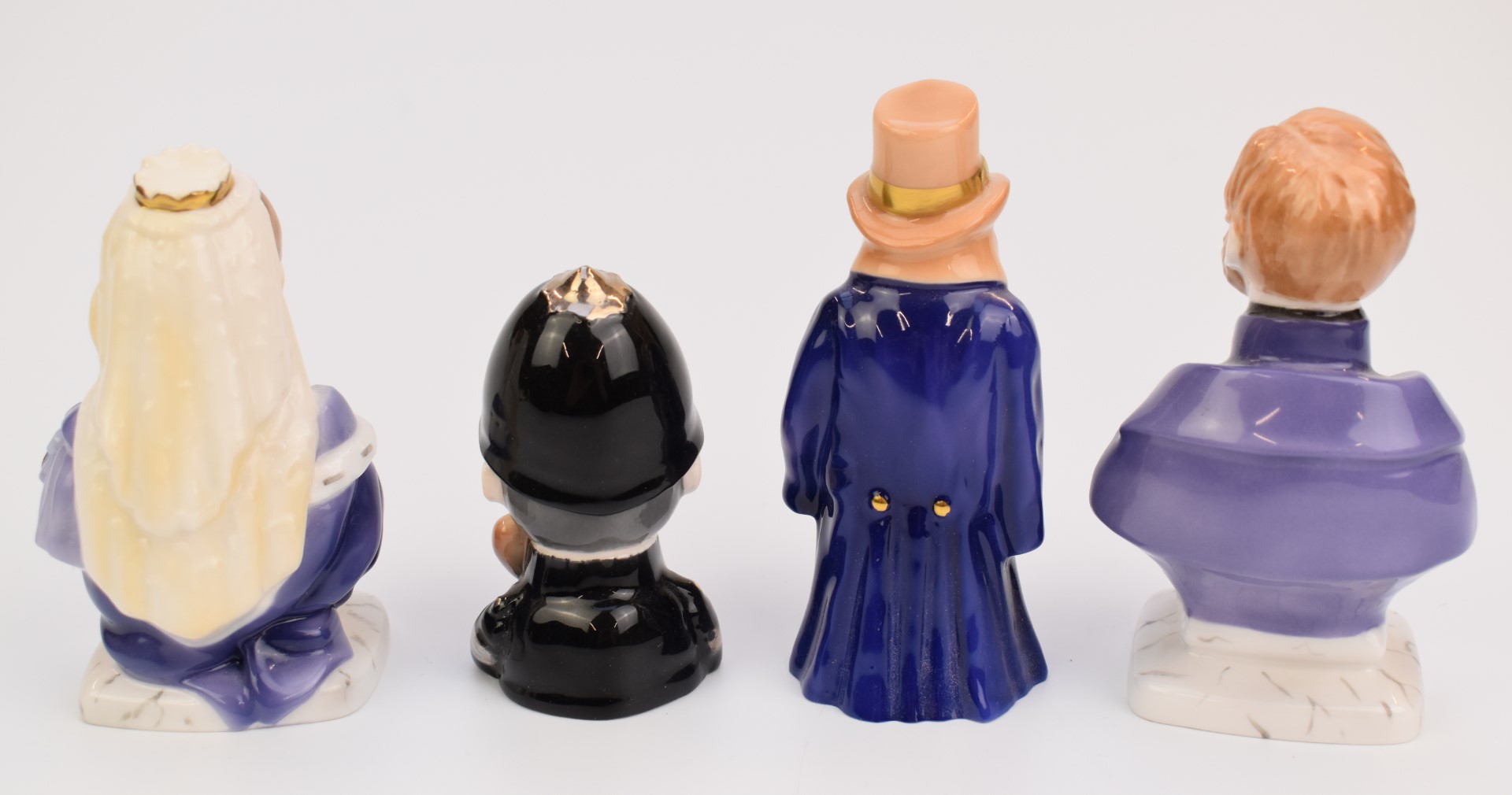 Four limited edition Royal Worcester candle snuffers comprising Budge, policeman, Queen Victoria and - Image 3 of 4