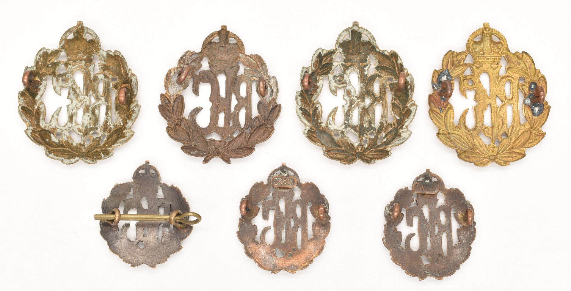 Seven WW1 Royal Flying Corps metal badges including a pair of collar badges, all with loops - Image 2 of 2