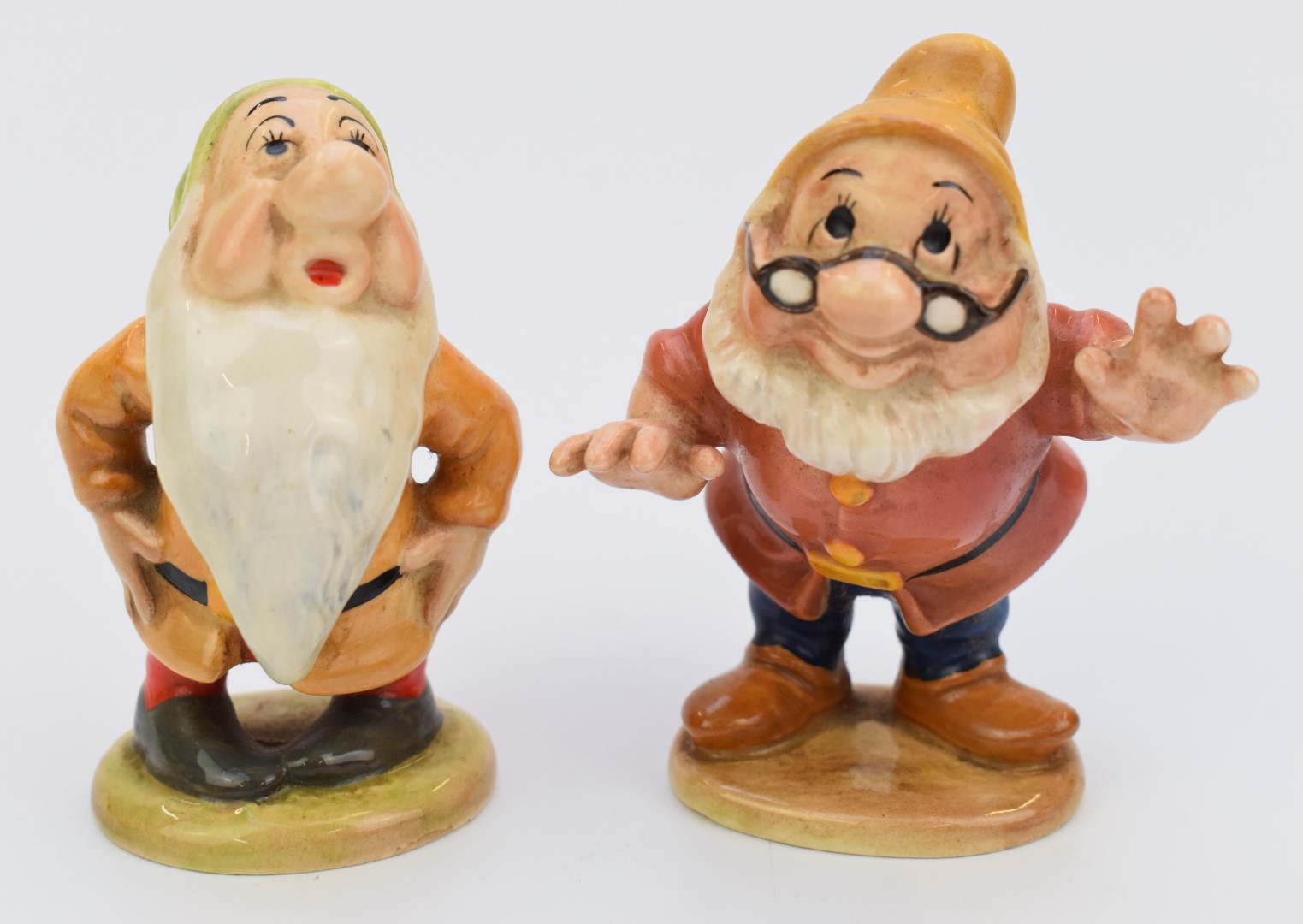 Beswick Walt Disney figures Doc and Sleepy from Snow White and the Seven Dwarfs, tallest 9.5cm