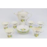 Twelve pieces of Shelley Art Deco tea ware decorated Tall Trees pattern