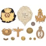 Five military interest badges including Bandsman's arm badge, Royal Marines together with a gilt