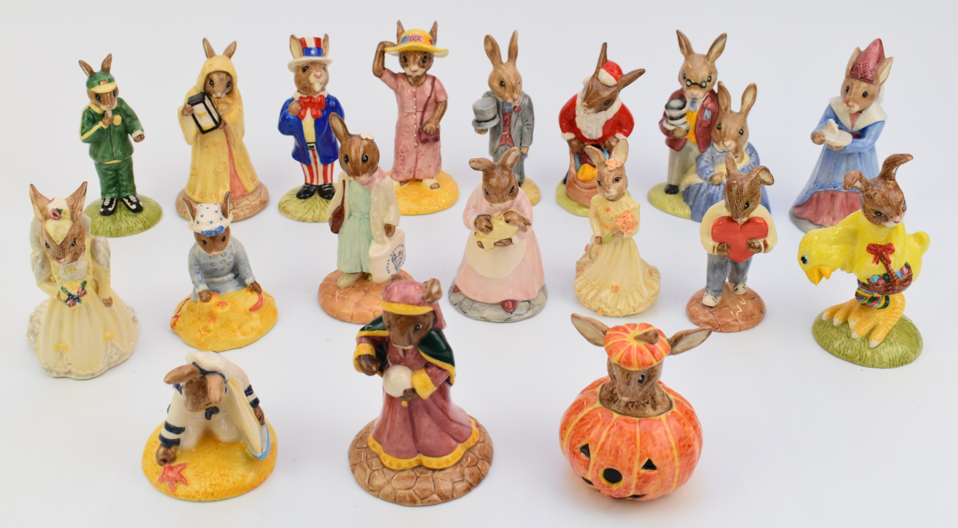 Eighteen Royal Doulton Bunnykins boxed figures including Bride, Groom, Sailor, Father / Mother DB68,