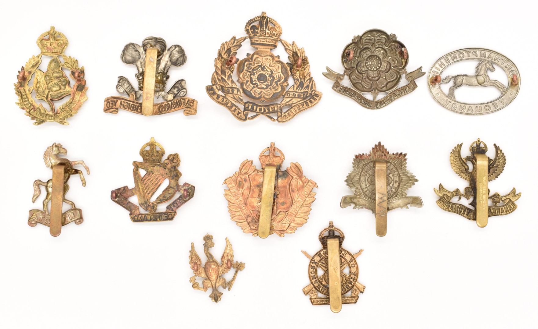 British Army 4th Royal Irish Dragoon Guards bi-metal cap badge and eleven metal Yeomanry badges - Image 2 of 2