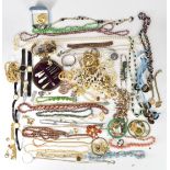 A collection of costume jewellery including beads, watches, Timex watch, chains and pendants,