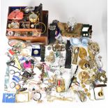 A collection of costume jewellery including brooches, necklaces, watches, coins, Parker pens,