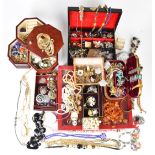 A collection of costume jewellery including Victorian silver brooch, amber, brooches, earrings,