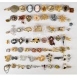 A collection of brooches including vintage examples, Suzanne Bjontegard, etc