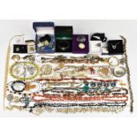 A collection of jewellery including agate beads, vintage, Sarah Coventry and Art Deco brooches,