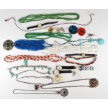 A collection of costume jewellery including glass beaded necklaces, Art Deco necklace, filigree