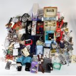 A collection of costume jewellery including brooches, necklaces, etc