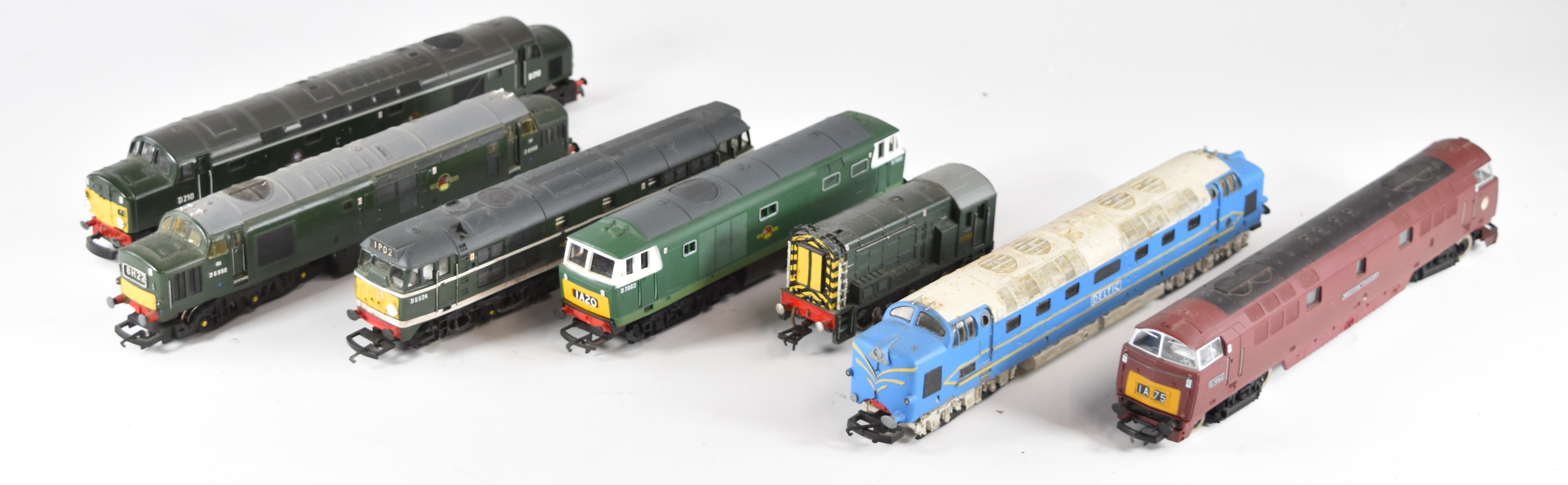 Seven 00 gauge model railway diesel locomotives comprising Hornby Western, Lima Deltic, Jouef