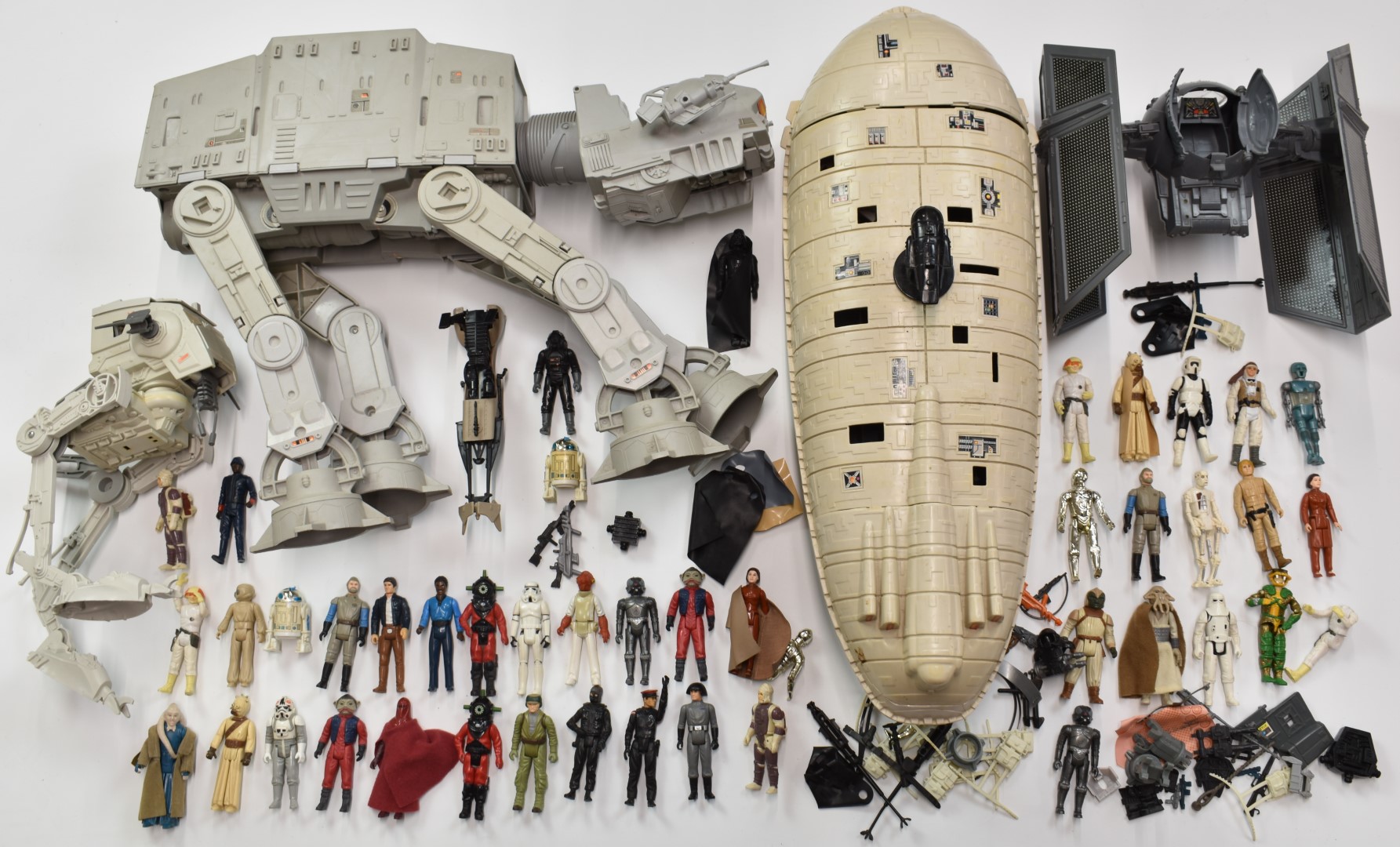 A collection of vintage Star Wars Figures and vehicles to include AT-AT, AT-ST x2, Scout Bike, Rebel