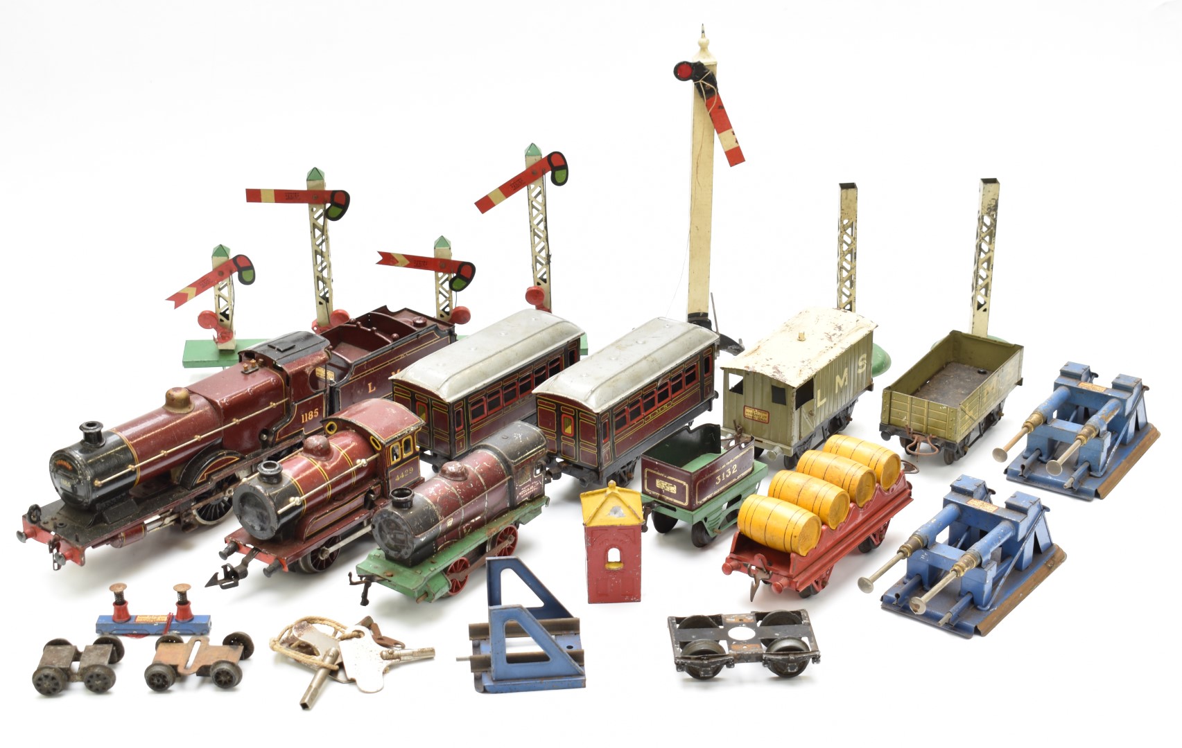 Hornby and Bing 0 gauge model railway items comprising Hornby clockwork 4-4-0 tender locomotive,